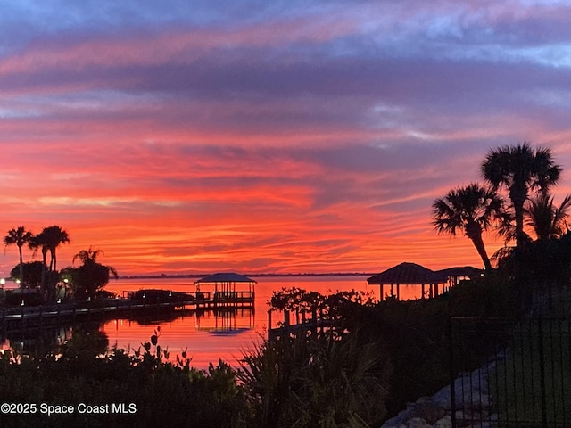 603 Manatee Bay Dr, Cape Canaveral, FL 32920 - water view featuring a boat dock