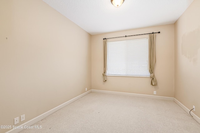 603 Manatee Bay Dr, Cape Canaveral, FL 32920 - carpeted spare room with baseboards