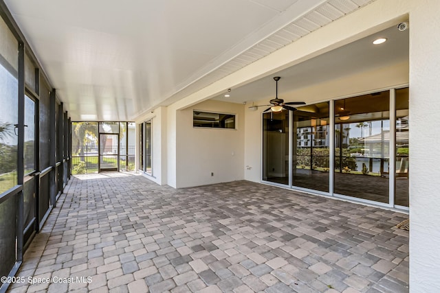 603 Manatee Bay Dr, Cape Canaveral, FL 32920 - unfurnished sunroom with a ceiling fan and a water view