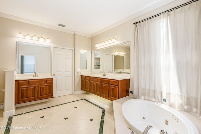 603 Manatee Bay Dr, Cape Canaveral, FL 32920 - full bath featuring ornamental molding, vanity, a tub with jets, tile patterned floors, and baseboards
