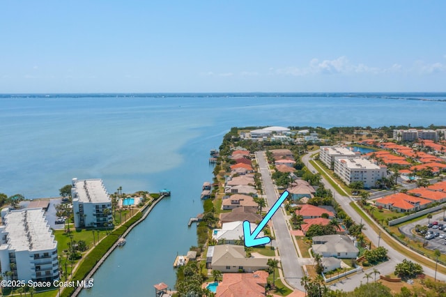 603 Manatee Bay Dr, Cape Canaveral, FL 32920 - aerial view of a nearby body of water
