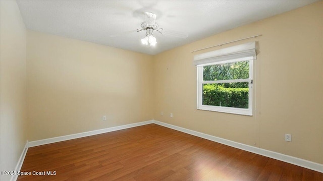 5395 Amy Way, Mims, FL 32754 - empty room featuring ceiling fan, baseboards, and wood finished floors
