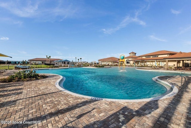 pool with a patio