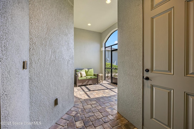 exterior space featuring a patio and stucco siding