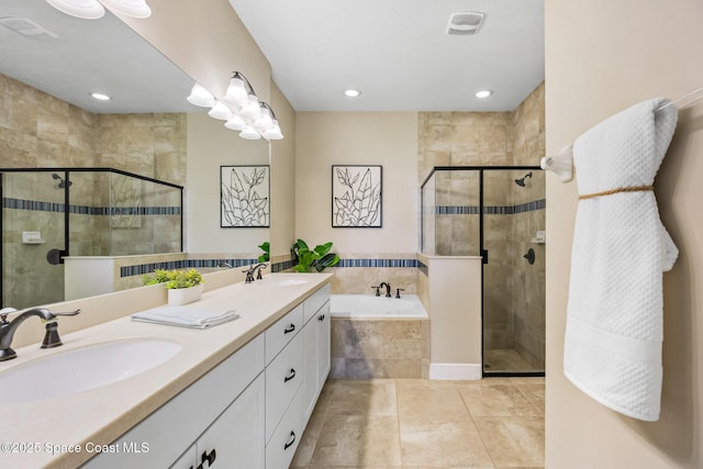 full bathroom with a shower stall, recessed lighting, a garden tub, and a sink