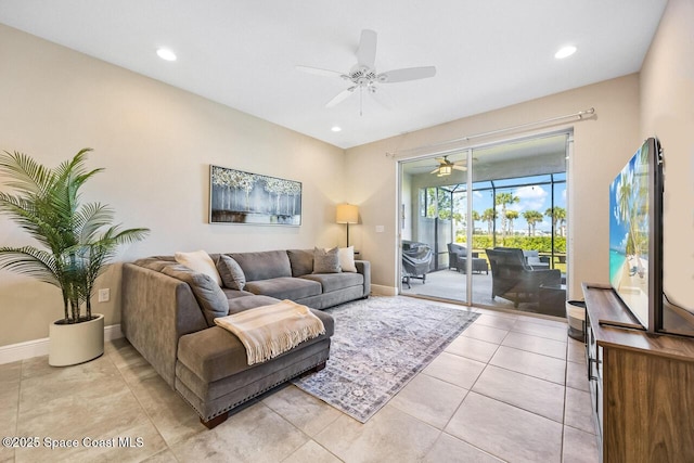 living area with ceiling fan, baseboards, light tile patterned flooring, and recessed lighting