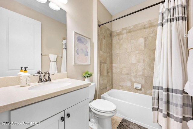 full bath featuring shower / bath combo with shower curtain, vanity, tile patterned flooring, and toilet
