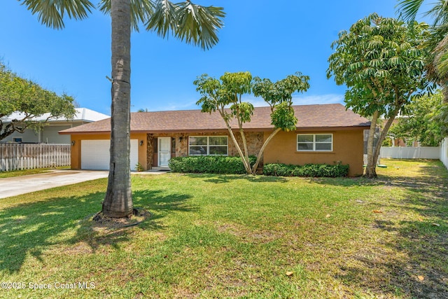 36 Mohican Way, Melbourne Beach, FL 32951 - ranch-style house with concrete driveway, an attached garage, and stucco siding