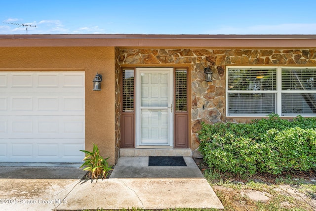 36 Mohican Way, Melbourne Beach, FL 32951 - property entrance with stone siding and stucco siding