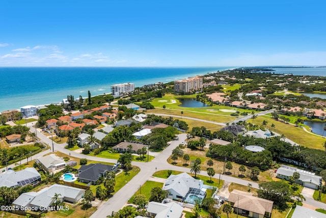 36 Mohican Way, Melbourne Beach, FL 32951 - aerial view of property and surrounding area with a nearby body of water, nearby suburban area, and a golf course