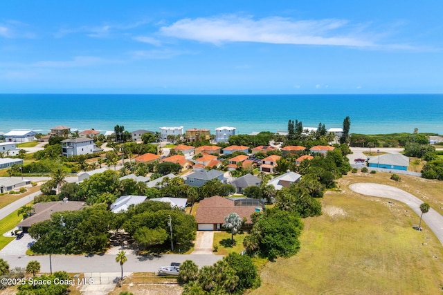 36 Mohican Way, Melbourne Beach, FL 32951 - aerial view of residential area featuring a nearby body of water