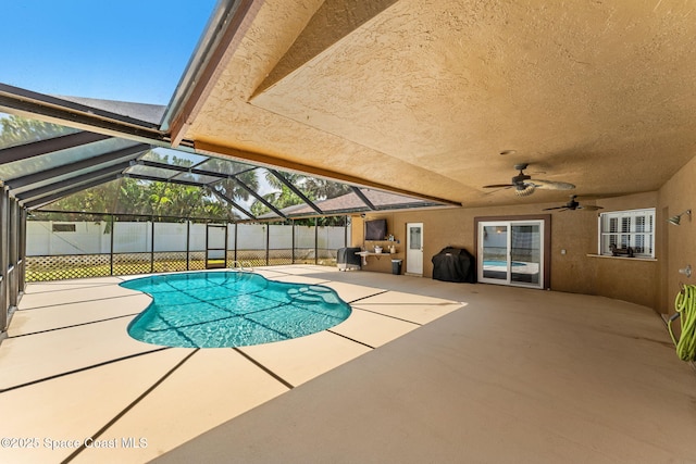 36 Mohican Way, Melbourne Beach, FL 32951 - view of swimming pool with a patio area, ceiling fan, fence, and a lanai