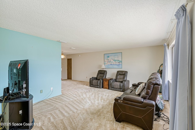 265 Sheridan Ave, Satellite Beach, FL 32937 - carpeted living area with a textured ceiling