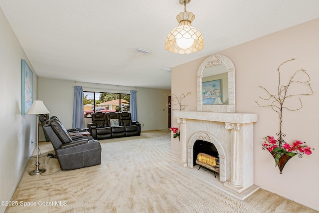 265 Sheridan Ave, Satellite Beach, FL 32937 - carpeted living room with visible vents, baseboards, and a fireplace