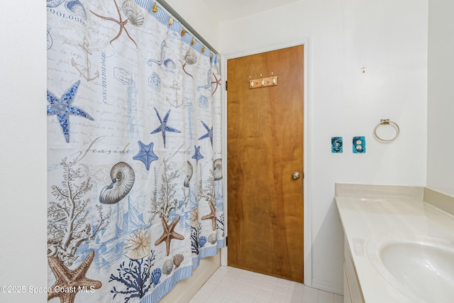 265 Sheridan Ave, Satellite Beach, FL 32937 - bathroom with vanity and a shower with shower curtain
