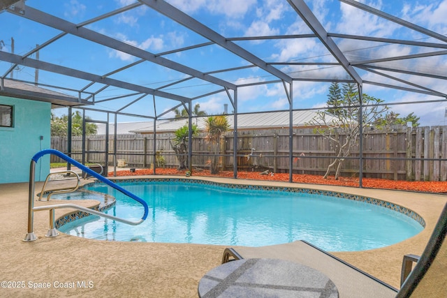265 Sheridan Ave, Satellite Beach, FL 32937 - view of pool featuring a patio, a fenced in pool, a lanai, and a fenced backyard