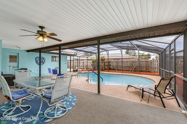 265 Sheridan Ave, Satellite Beach, FL 32937 - view of pool featuring a ceiling fan, glass enclosure, a fenced in pool, a fenced backyard, and a patio