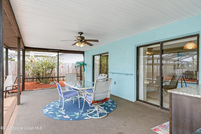 265 Sheridan Ave, Satellite Beach, FL 32937 - sunroom with outdoor dining area, ceiling fan, and a wealth of natural light