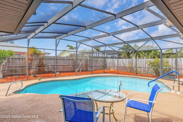 265 Sheridan Ave, Satellite Beach, FL 32937 - view of pool featuring a patio, a fenced backyard, glass enclosure, and a fenced in pool