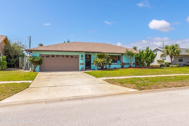 265 Sheridan Ave, Satellite Beach, FL 32937 - single story home featuring a shingled roof, an attached garage, a front lawn, stucco siding, and concrete driveway