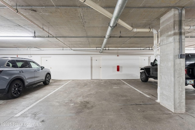 551 Casa Bella Dr Unit 501, Cape Canaveral, FL 32920 - view of parking garage