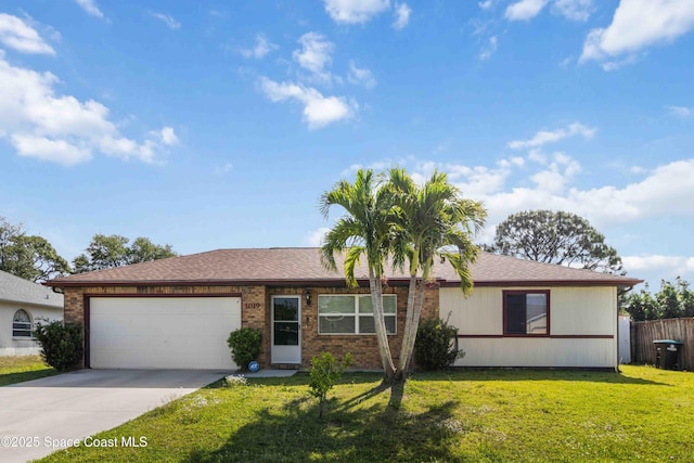 1019 Lee Ave NW, Palm Bay, FL 32907 - single story home featuring driveway, a front lawn, brick siding, a garage, and fence