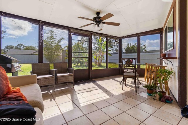 1019 Lee Ave NW, Palm Bay, FL 32907 - sunroom featuring a healthy amount of sunlight and ceiling fan