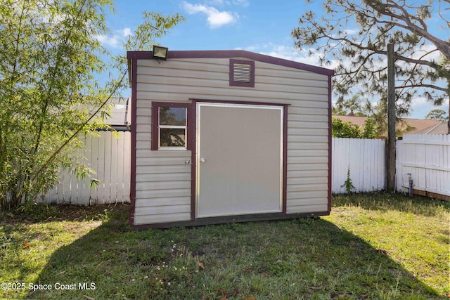 1019 Lee Ave NW, Palm Bay, FL 32907 - view of shed with a fenced backyard