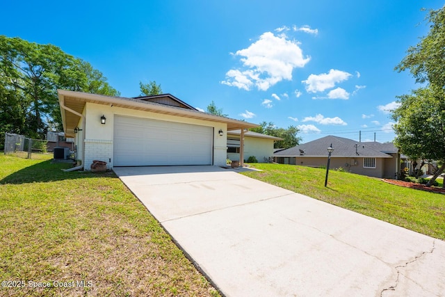 2102 E Parkton Dr, Deltona, FL 32725 - ranch-style house with brick siding, central AC unit, driveway, and a front yard