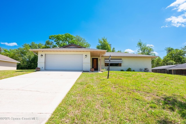 2102 E Parkton Dr, Deltona, FL 32725 - single story home featuring a front lawn, driveway, an attached garage, and brick siding
