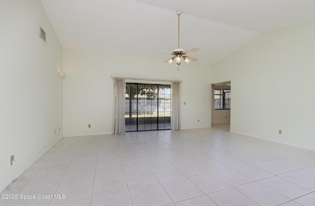 2062 Bottlebrush Dr, Melbourne, FL 32935 - empty room with high vaulted ceiling, light tile patterned floors, visible vents, and ceiling fan