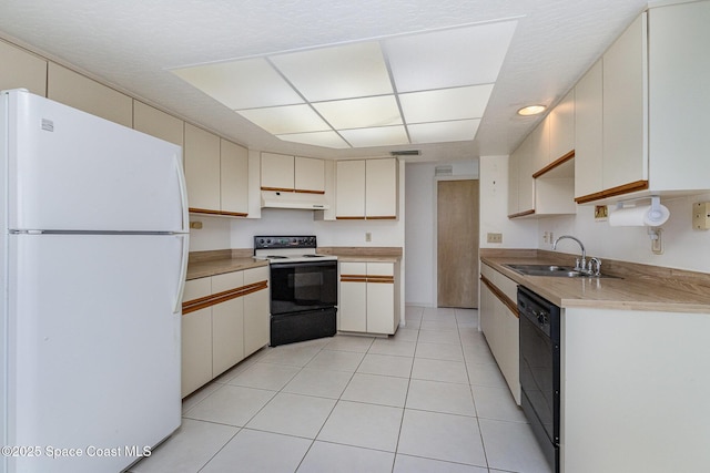 2062 Bottlebrush Dr, Melbourne, FL 32935 - kitchen featuring freestanding refrigerator, electric range, under cabinet range hood, dishwasher, and a sink