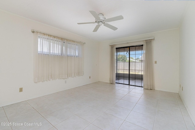 2062 Bottlebrush Dr, Melbourne, FL 32935 - unfurnished room featuring light tile patterned floors and a ceiling fan