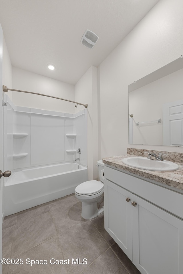 830 Remington Green Dr SE, Palm Bay, FL 32909 - bathroom with visible vents, vanity, toilet, tile patterned floors, and shower / washtub combination