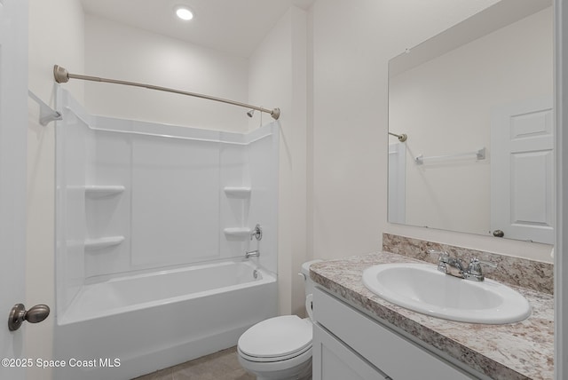 830 Remington Green Dr SE, Palm Bay, FL 32909 - bathroom with vanity, tub / shower combination, and toilet