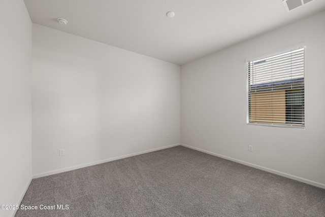 830 Remington Green Dr SE, Palm Bay, FL 32909 - unfurnished room featuring baseboards, carpet, and visible vents