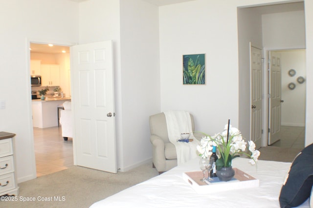 830 Remington Green Dr SE, Palm Bay, FL 32909 - bedroom with baseboards and light carpet