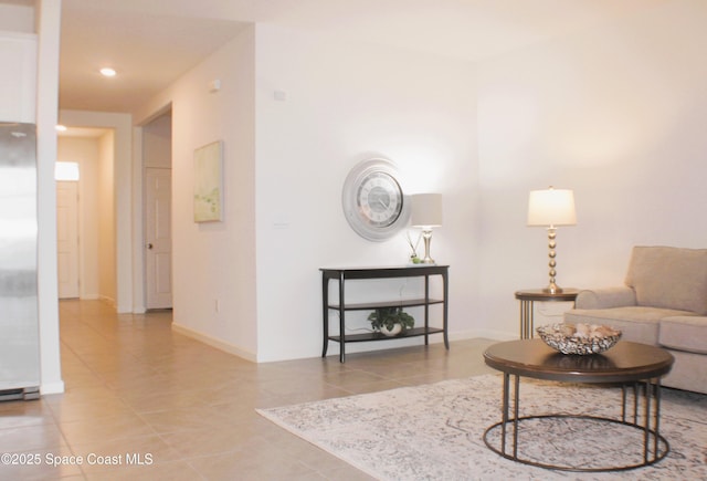 830 Remington Green Dr SE, Palm Bay, FL 32909 - tiled living area with recessed lighting and baseboards