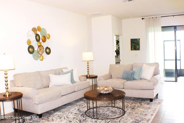 830 Remington Green Dr SE, Palm Bay, FL 32909 - living area with tile patterned floors and visible vents