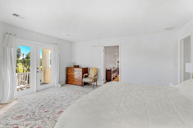 bedroom featuring french doors, access to exterior, and visible vents