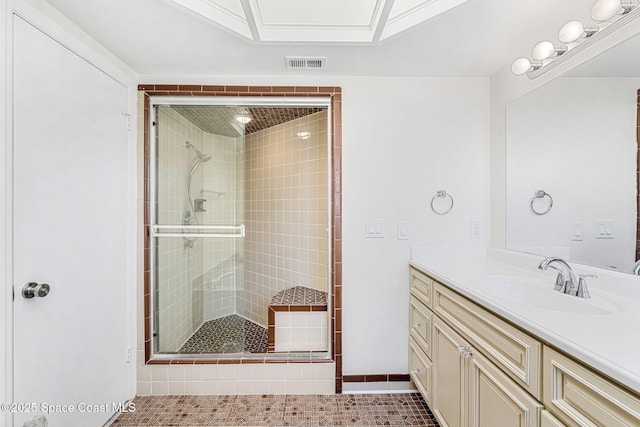 full bathroom featuring visible vents, baseboards, tile patterned flooring, vanity, and a stall shower