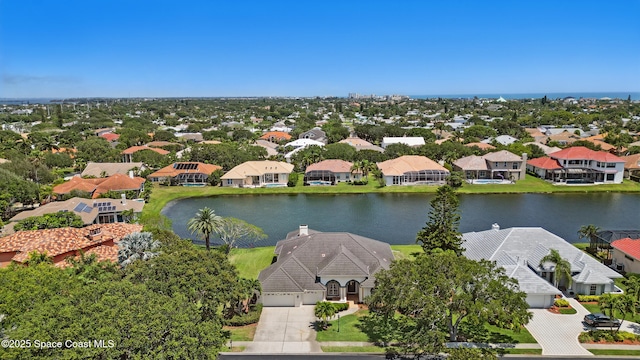 aerial view of residential area with a nearby body of water