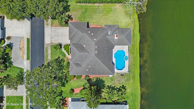 drone / aerial view of a pool