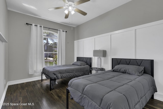 1900 Jacques Dr, Melbourne, FL 32940 - bedroom with a decorative wall, dark wood-style floors, and ceiling fan