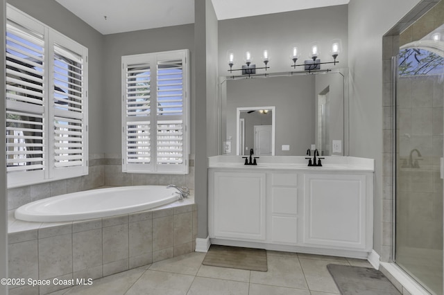 1900 Jacques Dr, Melbourne, FL 32940 - bathroom with a bath, tile patterned floors, a sink, and a shower stall