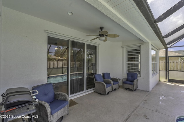 1900 Jacques Dr, Melbourne, FL 32940 - view of patio with a lanai, ceiling fan, and fence