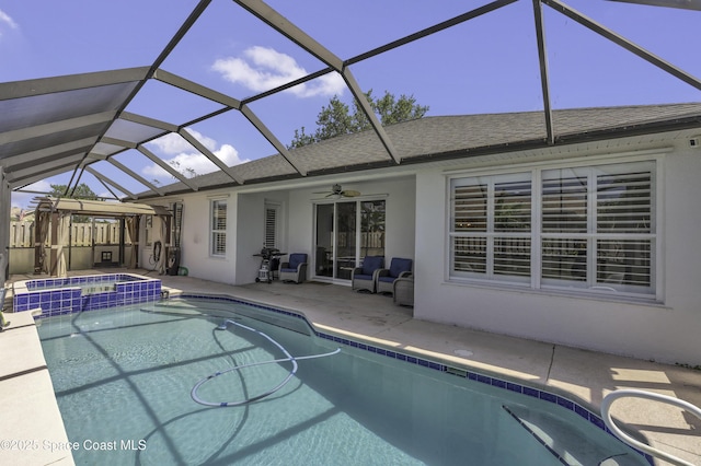 1900 Jacques Dr, Melbourne, FL 32940 - view of swimming pool with a lanai, a patio, ceiling fan, and a pool with connected hot tub