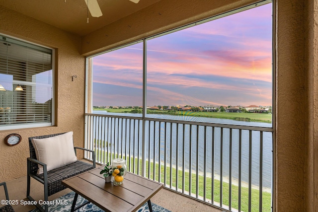 6838 Toland Dr Unit 307, Melbourne, FL 32940 - balcony featuring a ceiling fan and a water view