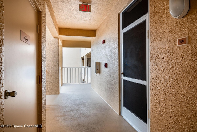 6838 Toland Dr Unit 307, Melbourne, FL 32940 - hall featuring an upstairs landing