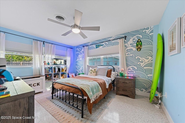 216 Cynthia Ln, Indian Harbour Beach, FL 32937 - bedroom with ceiling fan, speckled floor, baseboards, and visible vents